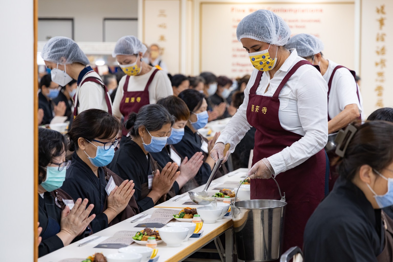 Behind-the-scenes heroes: volunteers and Bodhisattvas who made the ceremony a complete success.