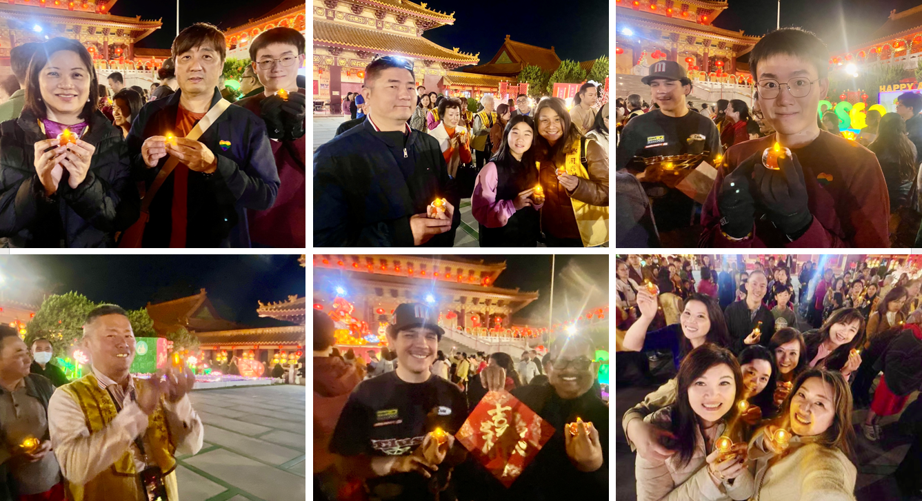 會員們手捧紅色「心」燈，齊聚成佛大道，在佛前虔誠獻燈祈願。