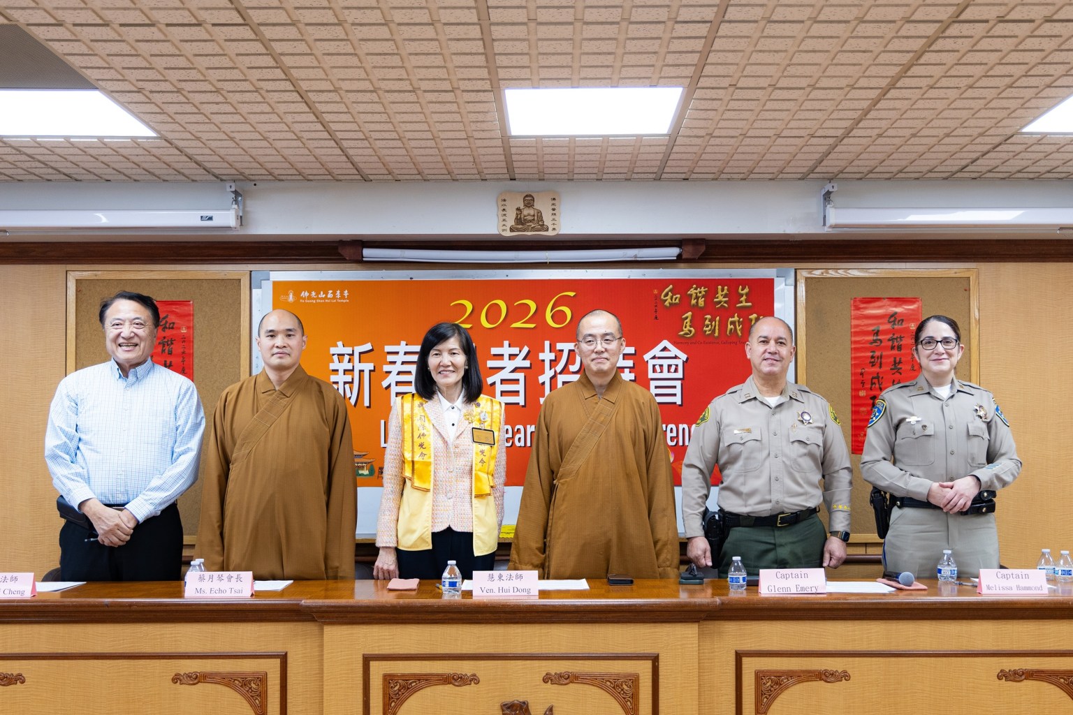 (From right) Glenn Emery, Chief of the City of Industry Police Department; Venerable Huidong, Abbot of Fo Guang Shan Hsi Lai Temple; Tsai Yueh-chin, President of the Buddha's Light International Association Los Angeles Chapter; Venerable Huicheng of Hsi Lai Temple's Local Community Affairs Division; Kenny Chang, CEO of KCal Insurance; and Melissa Hammond, Commander of the California Highway Patrol Santa Fe Springs Area Office, pose for a group photo in Fragrant Cloud Hall following the Lunar New Year press conference.