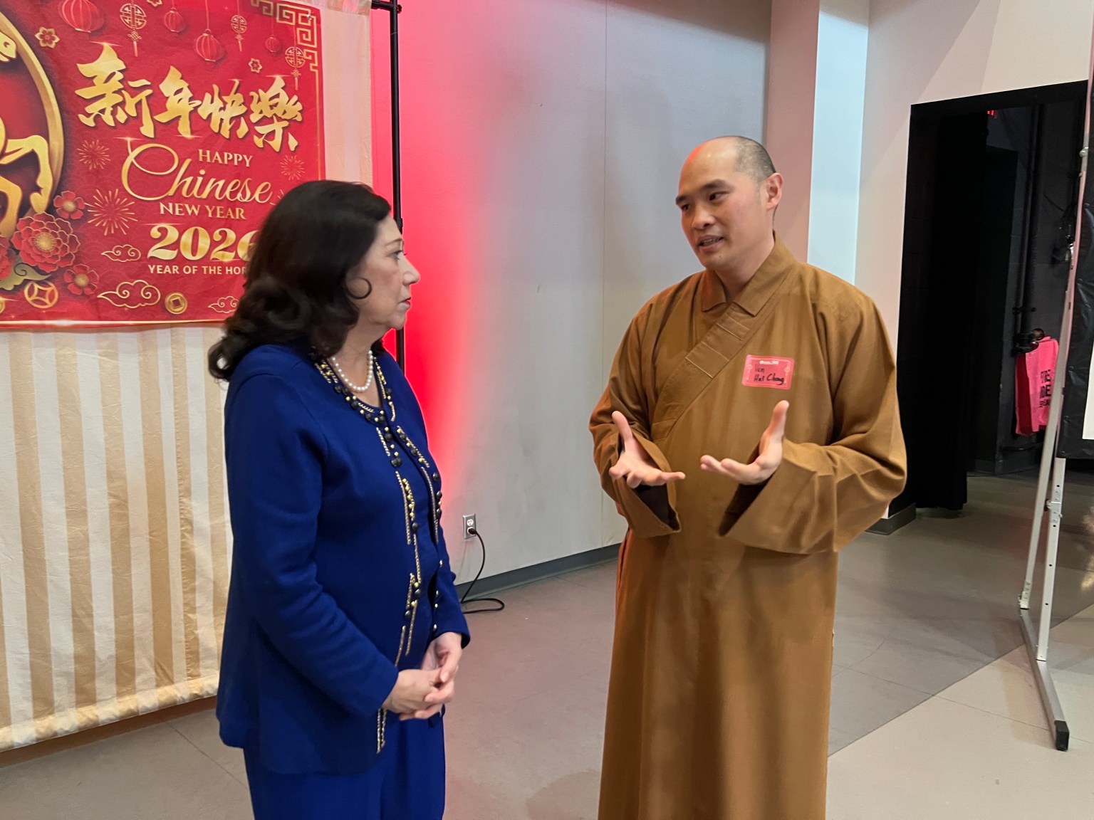 Venerable Huicheng speaks with Los Angeles County Supervisor Hilda L. Solis.
