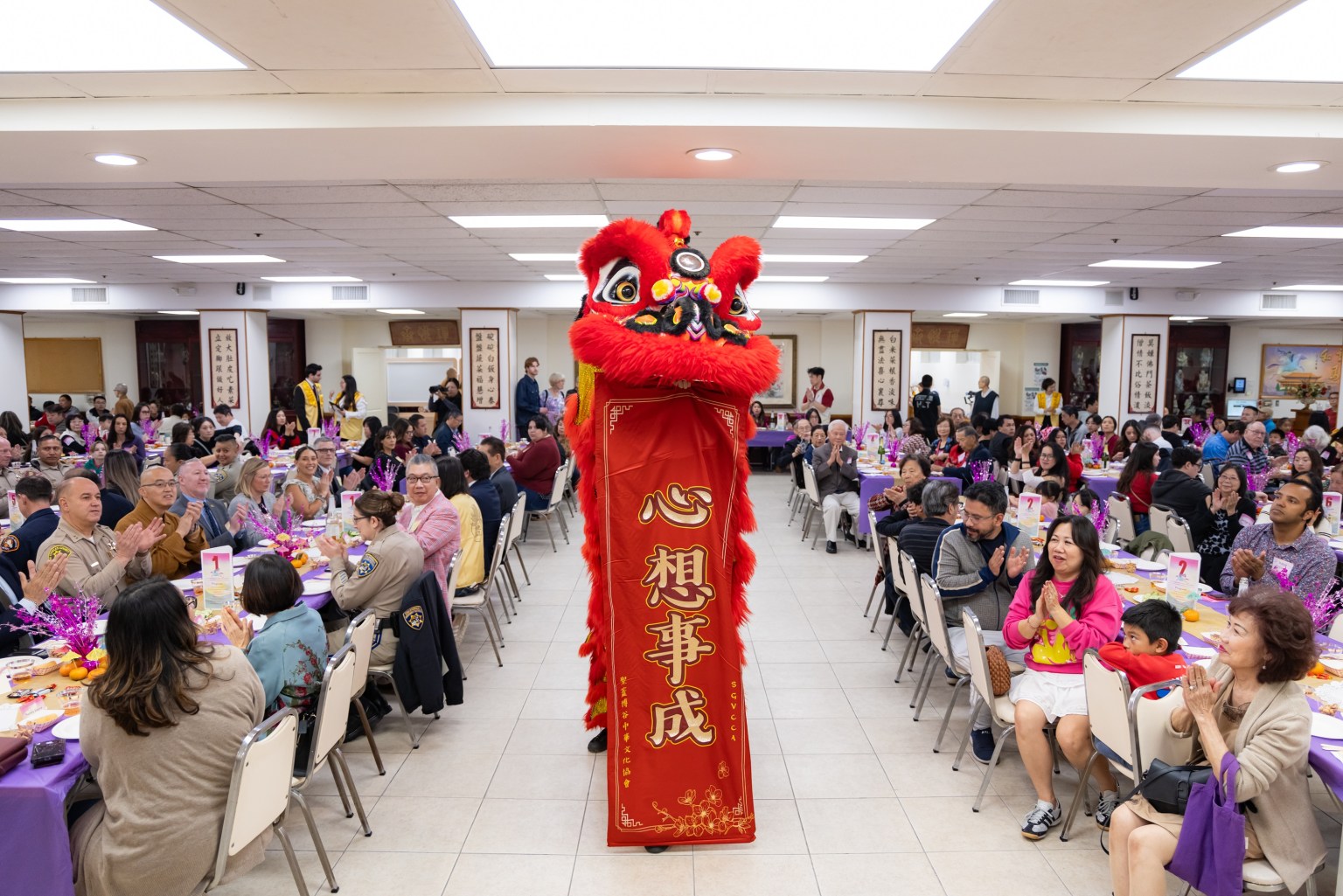 The Neighborhood Appreciation Banquet opens with an exciting lion dance performance by the Northern Shaolin Kung Fu Team.