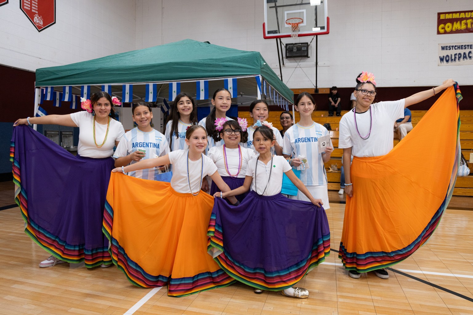 The Girl Scouts confidently pose for the camera.